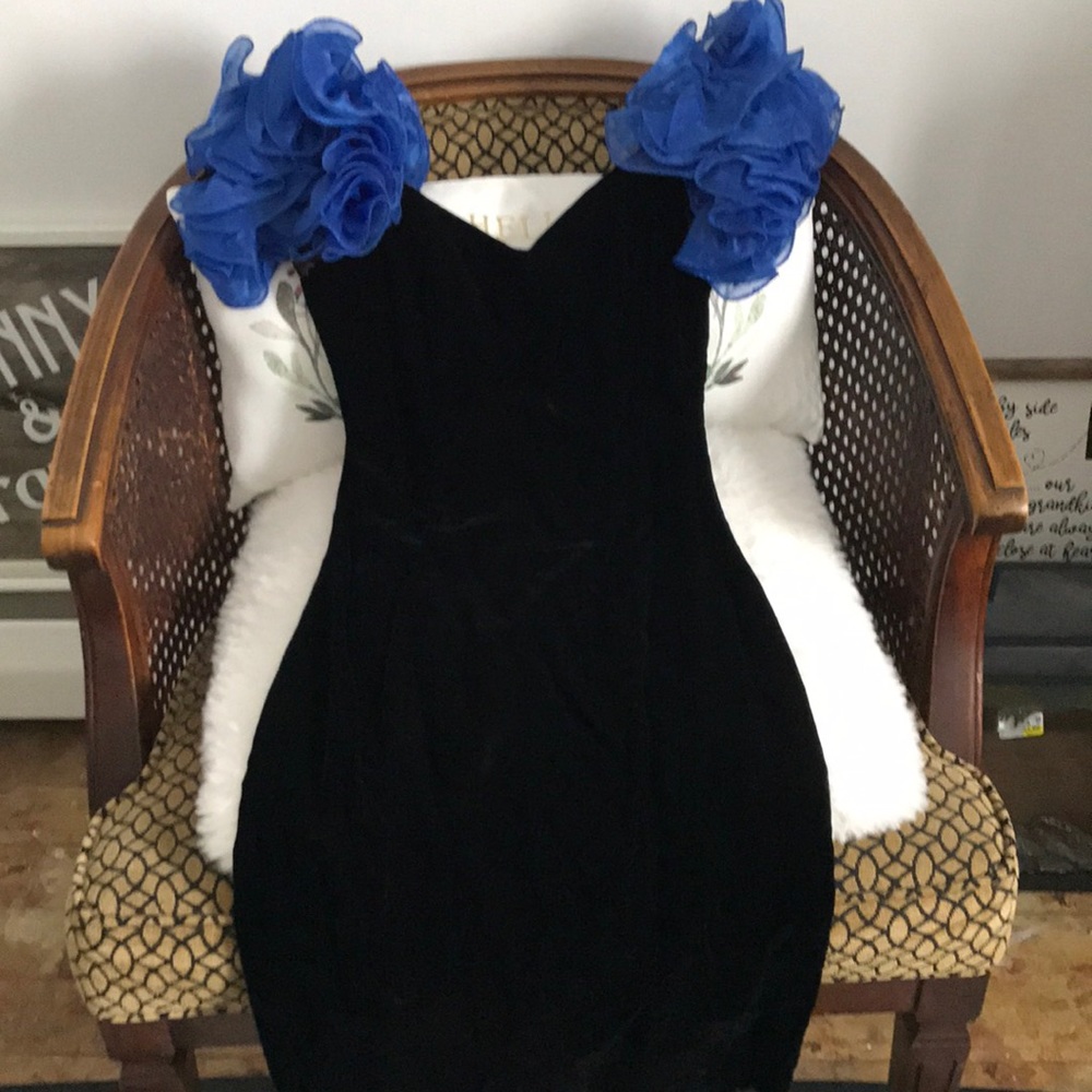 Vintage stunning dress in beautiful blue ruffles on arms